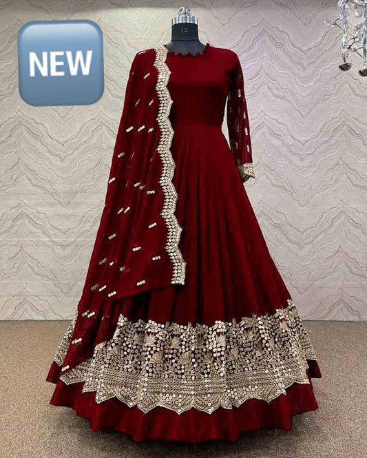 3 Pcs Women's Stitched Silk Embroidered Maxi with trouser and dupatta – Elegant party & wedding wear dress.